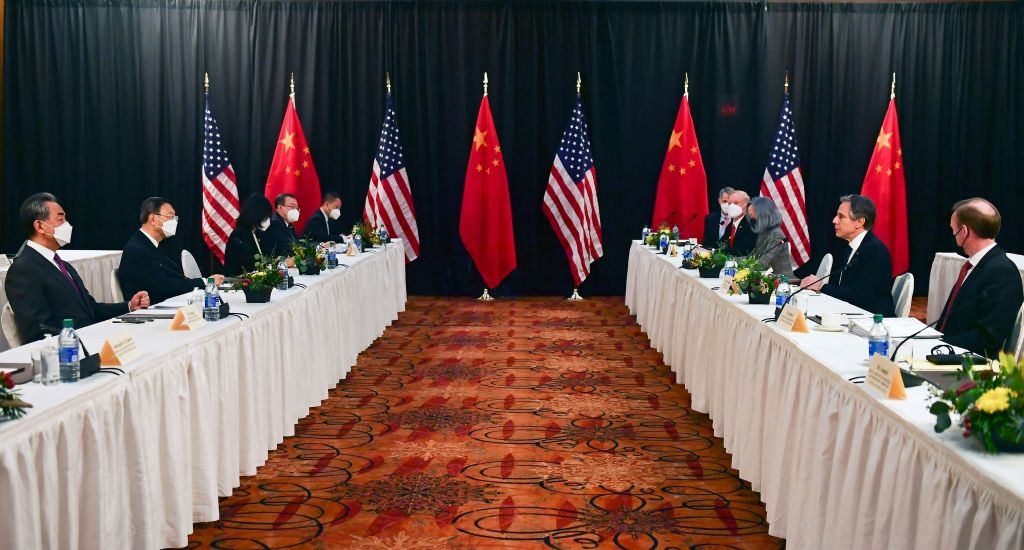 TOPSHOT - US Secretary of State Antony Blinken (2nd R), joined by National Security Advisor Jake Sullivan (R), speaks while facing Yang Jiechi (2nd L), director of the Central Foreign Affairs Commission Office, and Wang Yi (L), China's Foreign Minister at the opening session of US-China talks at the Captain Cook Hotel in Anchorage, Alaska on March 18, 2021. - China's actions "threaten the rules-based order that maintains global stability," US Secretary of State Antony Blinken said Thursday at the opening of a two-day meeting with Chinese counterparts in Alaska. (Photo by Frederic J. BROWN / POOL / AFP) (Photo by FREDERIC J. BROWN/POOL/AFP via Getty Images)