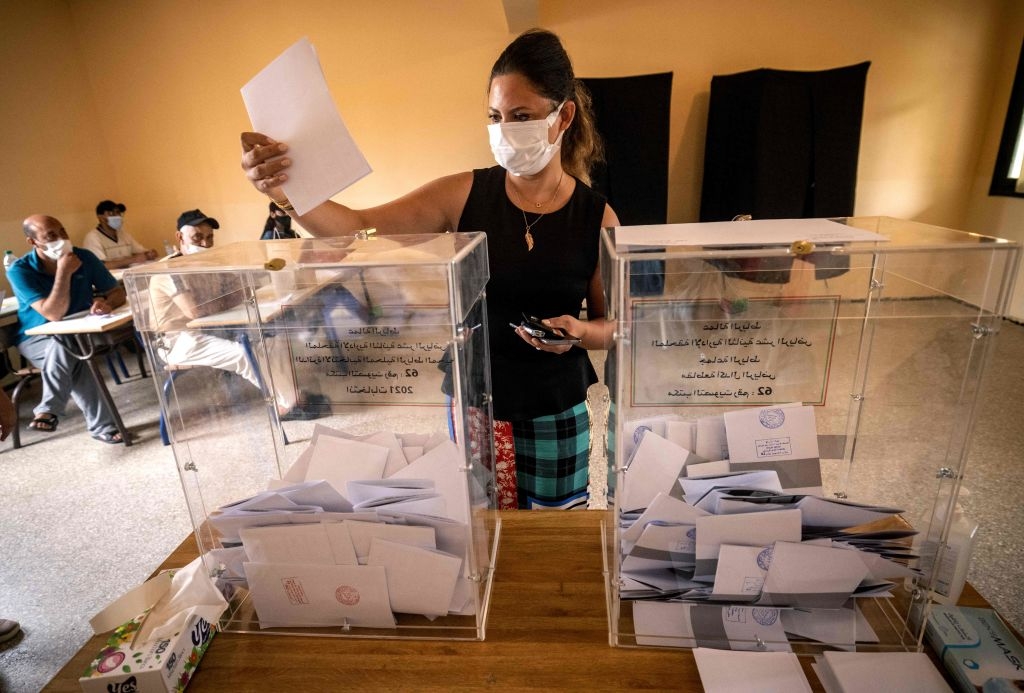 A woman prepares to cast her ballot during Morocco's parliamentary and local elections in the capital Rabat on September 8, 2021. (Photo by FADEL SENNA / AFP) (Photo by FADEL SENNA/AFP via Getty Images)