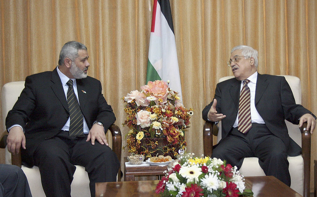 GAZA, GAZA STRIP - APRIL 5: In this handout photo supplied by the Palestinian Prime Minister's Office, Palestinian Prime Minister Ismail Hanyeh holds talks with Palestinian President, Mahmoud Abbas, in Haniyeh's office on April 5, 2007 in Gaza, Gaza Strip. Haniyeh is due to meet with a UK diplomat today to discuss the kidnapping of BBC journalist Alan Johnston who went missing on March 12, 2007. (Photo by Mohamed Alostaz/PPM via Getty Images)