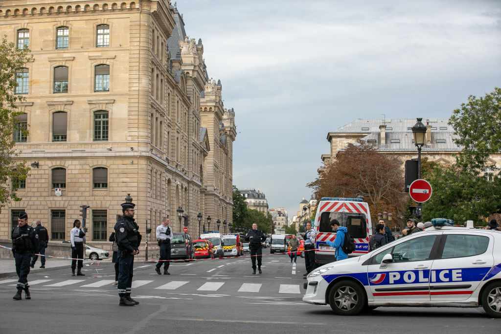 PARIS, FRANCE - OCTOBER 03:  Police personnel block the bridge near Paris Police headquarters after four officers were killed in a knife attack on October 3, 2019 in Paris, France. A civilian police worker wielding a knife stabbed and killed four officers at the police headquarters before being shot dead. (Photo by Marc Piasecki/Getty Images)