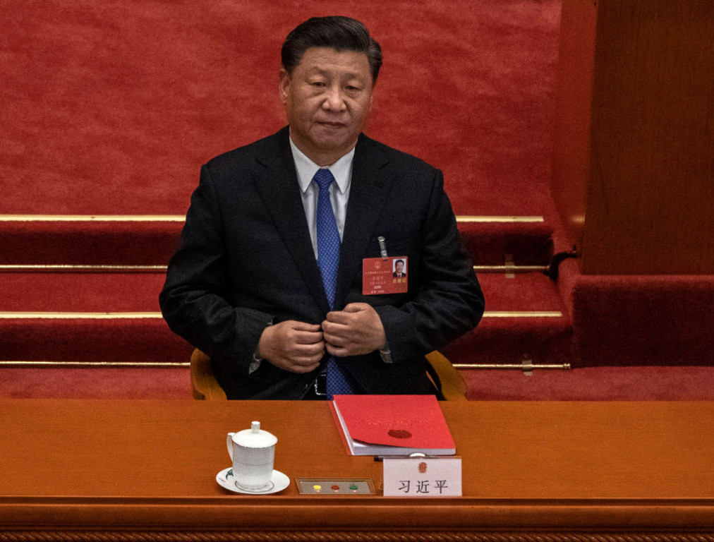 BEIJING, CHINA - MAY 28: Chinese president Xi Jinping listens during the closing session of the National People's Congress, which included a vote on a new draft security bill for Hong Kong, at the Great Hall of the People on May 28, 2020 in Beijing, China. The Chinese government passed the draft by a vote of 2,878 votes to one during the session. The draft law, which has drawn international concern, is set to address issues such as secession, subversion, terrorism, and foreign interference, comes after a year of anti-government protests in the semi-autonomous region. China held its annual parliamentary gathering, known as 'The Two Sessions', at the Great Hall of the People from May 21-28th after being postponed at the height of the coronavirus outbreak in China earlier this year. (Photo by Kevin Frayer/Getty Images)