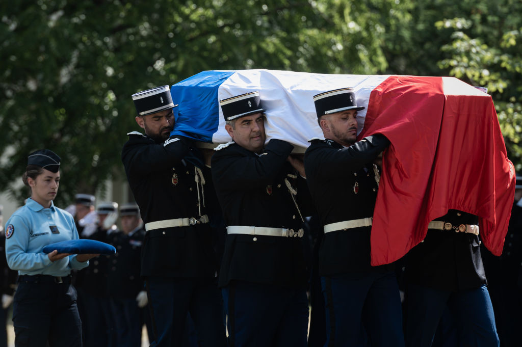 French gendarmes carry the coffin of late Gendarme Melanie Lemee, who died after being hit by a car at a military checkpoint on July 4, during a tribute ceremony at the Gendarmerie headquarters in Merignac, near Bordeaux on July 9, 2020. - Lemee, who has been fatally hit by a car at a military checkpoint on the D813 road to Port-Sainte-Marie near Agen, has been posthumously awarded France's Legion of Honor. (Photo by Philippe LOPEZ / AFP) (Photo by PHILIPPE LOPEZ/AFP via Getty Images)
