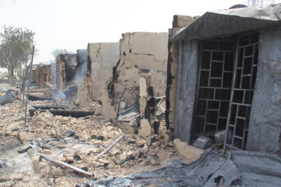 In this photograph taken in Auno on February 10, 2020, shops burnt down by suspected members of the Islamic State West Africa Province (ISWAP) during an attack on February 9, 2020, is seen. - Jihadists killed at least 30 people and abducted women and children in a raid in northeast Nigeria's restive Borno state, a regional government spokesman said on February 10, 2020. The attack on February 9, 2020 targeted the village of Auno where jihadists stormed in on trucks mounted with heavy weapons, killing, burning and looting before kidnapping women and children. (Photo by AUDU MARTE / AFP) (Photo by AUDU MARTE/AFP via Getty Images)