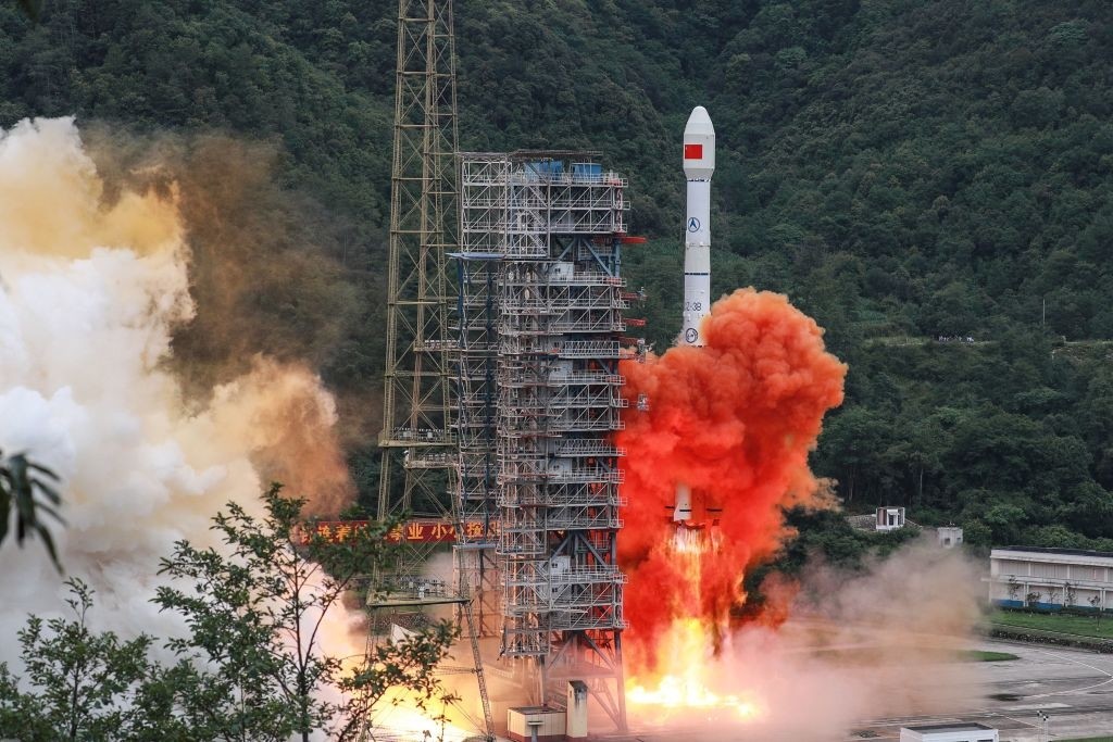 TOPSHOT - A Long March 3B rocket carrying the Beidou-3GEO3 satellite lifts off from the Xichang Satellite Launch Center in Xichang in China's southwestern Sichuan province on June 23, 2020. - China on June 23 launched the final satellite in its homegrown geolocation system designed to rival the US GPS network, marking a major step in its race for market share in the lucrative sector. (Photo by STR / AFP) / China OUT (Photo by STR/AFP via Getty Images)
